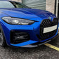 Gloss black front lip splitter spoiler body kit installed on a 2020-2023 BMW 4 Series M Sport G22 / G23