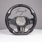 Carbon fiber heated performance steering wheel installed on a 2018-2024 BMW X1/X2 (F39), 5 Series (G30/G31), X3 (G01), X5 (G05), X6 (G06), X7 (G07), or M3 (G80)