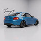 Carbon look front splitter, rear diffuser, side skirts, and trunk spoiler body kit installed on a 2016-2021 BMW M2 F87.