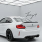 Carbon fiber-look PSM-style high kick ducktail spoiler installed on a 2014-2021 BMW 2 Series / M2 F22 Coupe / F87 M2