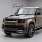 Gloss black front lip splitter lower bumper kit installed on a 2020-2025 Land Rover Defender L663
