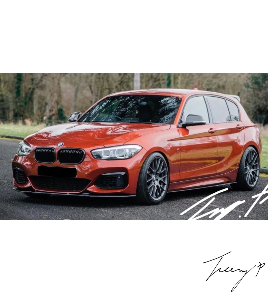 Gloss black side skirt rocker panel extensions installed on a 2015-2020 BMW 1 Series LCI F20 / F21