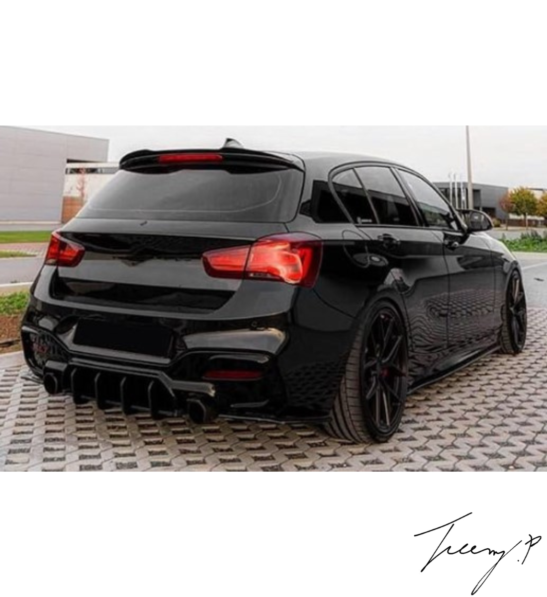 Gloss black Blade-style rear diffuser installed on a 2015-2019 BMW 1 Series LCI F20 / F21 M135i / M140i