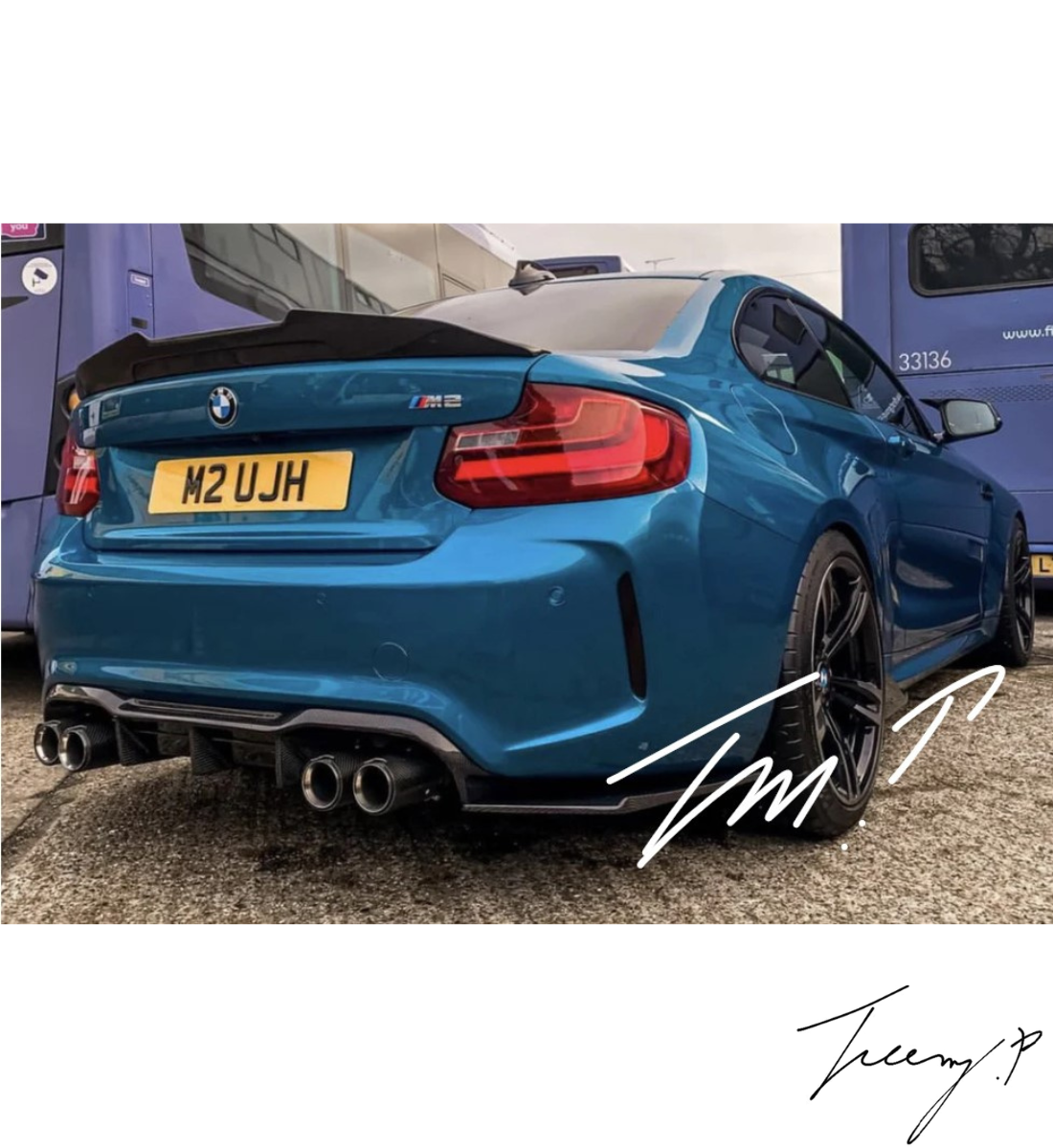 Carbon fiber-look MTC-style rear diffuser splitter installed on a 2015-2020 BMW M2 F87
