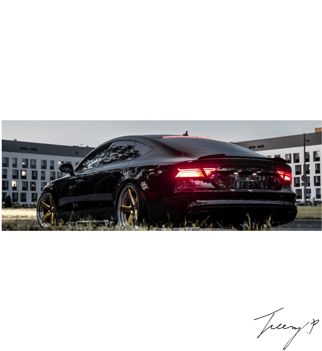 Gloss black rear boot trunk spoiler lip wing installed on a 2010-2018 Audi A7 Sedan (Sportback)