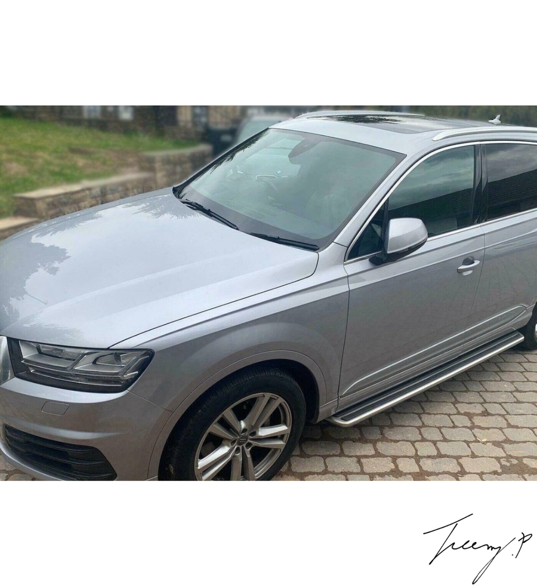 OEM-design aluminum and ABS side step running boards installed on a 2016-2023 Audi Q7 (4M)