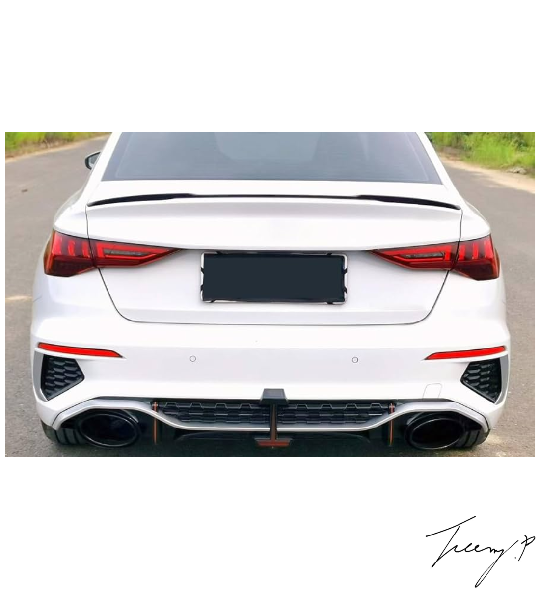 Gloss black RS3-style rear diffuser with black exhaust tips installed on a 2021-2024 Audi A3 Saloon (8Y)