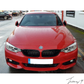 Gloss black front kidney grilles installed on a 2014-2020 BMW 4 Series / M3 / M4 F32 / F33 / F36 / F80 / F82 / F83