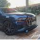 Gloss black front splitter lip installed on a 2018-2026 Audi Q8 S Line bumper