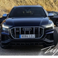 Gloss black front splitter lip installed on a 2018-2026 Audi Q8 S Line bumper