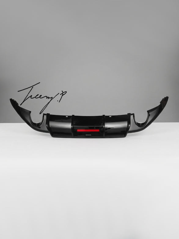 VW Golf MK7 GTI gloss black rear diffuser with LED lights sporty aggressive styling
