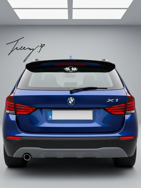 Gloss black rear roof spoiler boot wing lip for BMW X1 E84 (2012–2015).