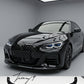 Gloss black front lip splitter spoiler body kit installed on a 2020-2023 BMW 4 Series M Sport G22 / G23