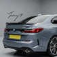 Gloss black high-kick PSM ducktail rear spoiler for BMW 2 Series F44 Gran Coupe (2021+).
