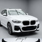Gloss black front splitter spoiler lip installed on a 2018-2021 BMW X3 Pre-LCI (G01) M Sport