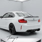 Carbon fiber-look PSM-style high kick ducktail spoiler installed on a 2014-2021 BMW 2 Series / M2 F22 Coupe / F87 M2