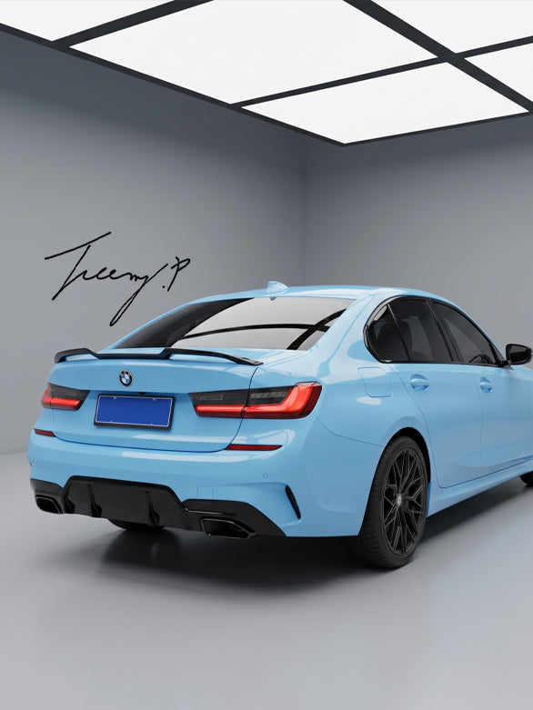 Gloss black V-style rear boot spoiler lip wing installed on a 2018-2023 BMW 3 Series / M3 G20 / G80