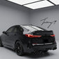 Rear diffuser spoiler body kit installed on a 2020-2024 BMW 2 Series Gran Coupe F44