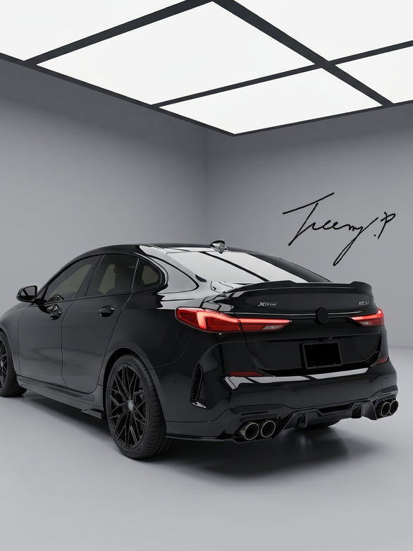 Rear diffuser spoiler body kit installed on a 2020-2024 BMW 2 Series Gran Coupe F44