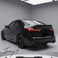 Rear diffuser spoiler body kit installed on a 2020-2024 BMW 2 Series Gran Coupe F44