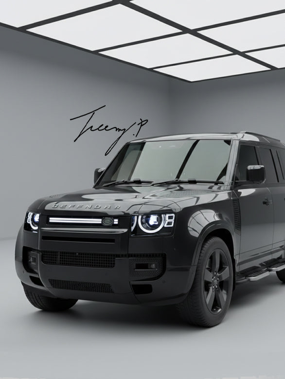 Gloss black front grille with integrated LED light installed on a 2020-2026 Land Rover Defender (L663)