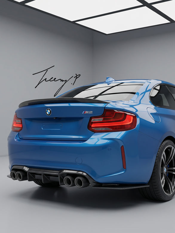 Carbon fiber-look MTC-style rear diffuser splitter installed on a 2015-2020 BMW M2 F87