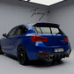 Gloss black Blade-style rear diffuser installed on a 2015-2019 BMW 1 Series LCI F20 / F21 M135i / M140i