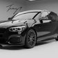 Gloss black side skirt rocker panel extensions installed on a 2015-2020 BMW 1 Series LCI F20 / F21