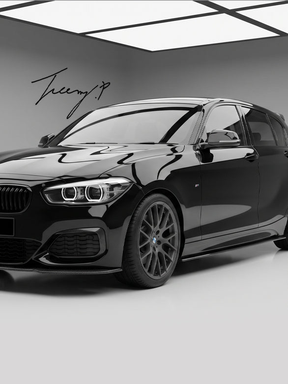 Gloss black side skirt rocker panel extensions installed on a 2015-2020 BMW 1 Series LCI F20 / F21