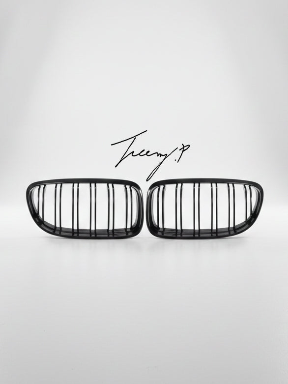 Gloss black OEM-fit double-slat front kidney grilles installed on a 2008-2012 BMW 3 Series LCI (E90 / E91)