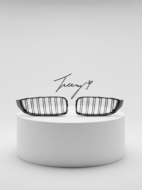 Gloss black front kidney grilles installed on a 2014-2020 BMW 4 Series / M3 / M4 F32 / F33 / F36 / F80 / F82 / F83
