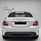 Gloss black rear diffuser with AMG tailpipes installed on a 2015-2020 Mercedes C-Class AMG / C63 W205 Sedan