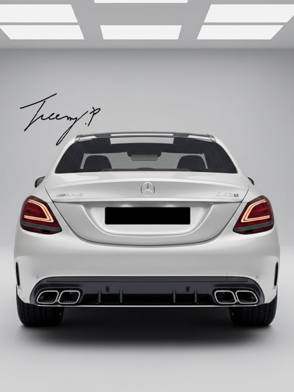 Gloss black rear diffuser with AMG tailpipes installed on a 2015-2020 Mercedes C-Class AMG / C63 W205 Sedan