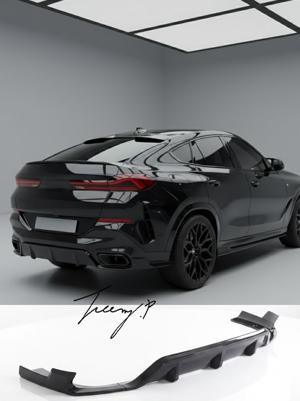 Gloss black rear bumper diffuser, lip splitters, and body kit installed on a 2019-2023 BMW X6 G06