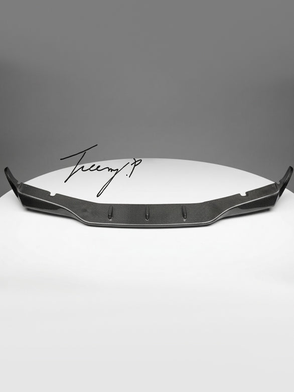 Carbon-look front bumper lip spoiler installed on a 2017-2020 BMW M5 F90 Pre-LCI