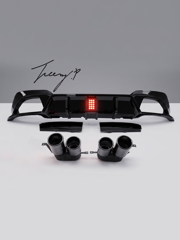 BMW 3 Series G20 G21 M Sport gloss black rear diffuser with light aggressive sporty styling
