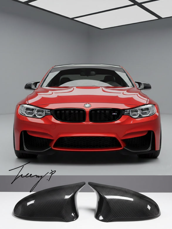 Real carbon fiber side mirror caps replacement installed on a 2014-2021 BMW M2 F87, M3 F80, or M4 F82