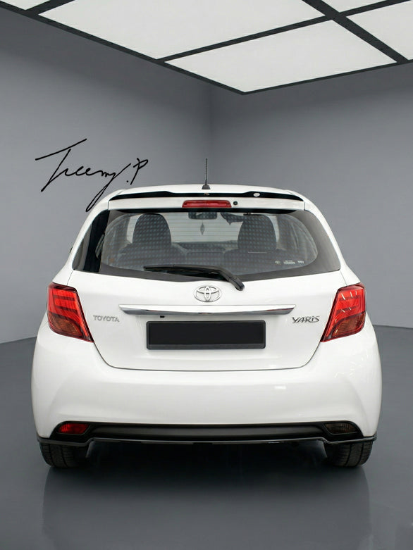 Rear bumper diffuser installed on a 2014-2017 Toyota Yaris.