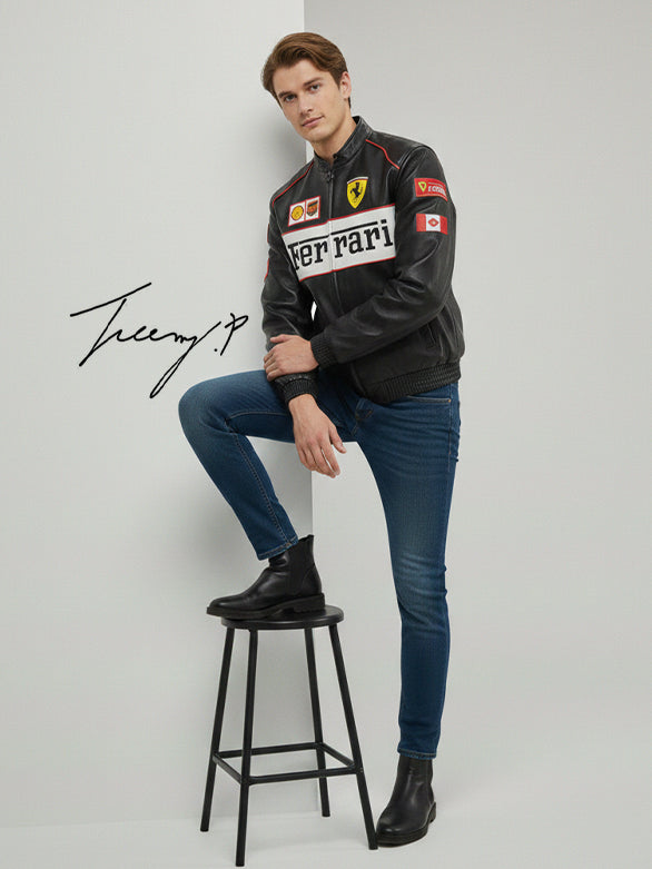 Black unisex leather-look Ferrari racing jacket with embroidered F1-style branding and hood.