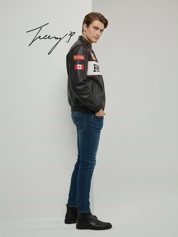 Black unisex leather-look Ferrari racing jacket with embroidered F1-style branding and hood.