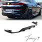 Gloss black rear bumper diffuser, lip splitters, and body kit installed on a 2019-2023 BMW X6 G06