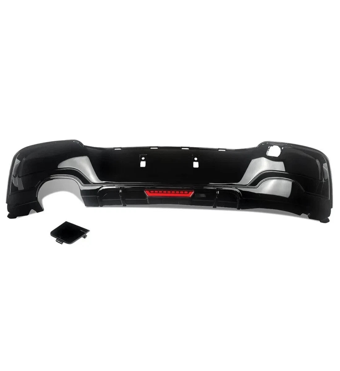 Carbon-look rear diffuser lip valance installed on a 2011-2015 BMW 1 Series Pre-LCI (F20 / F21)