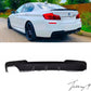 Gloss black twin-exit rear valance diffuser installed on a 2010-2017 BMW 5 Series (F10 / F11) M Sport
