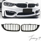 Gloss black front kidney grilles installed on a 2014-2020 BMW 4 Series / M3 / M4 F32 / F33 / F36 / F80 / F82 / F83
