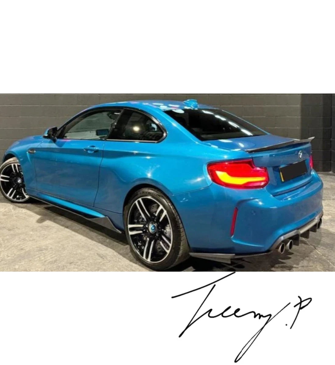 Carbon look front splitter, rear diffuser, side skirts, and trunk spoiler body kit installed on a 2016-2021 BMW M2 F87.