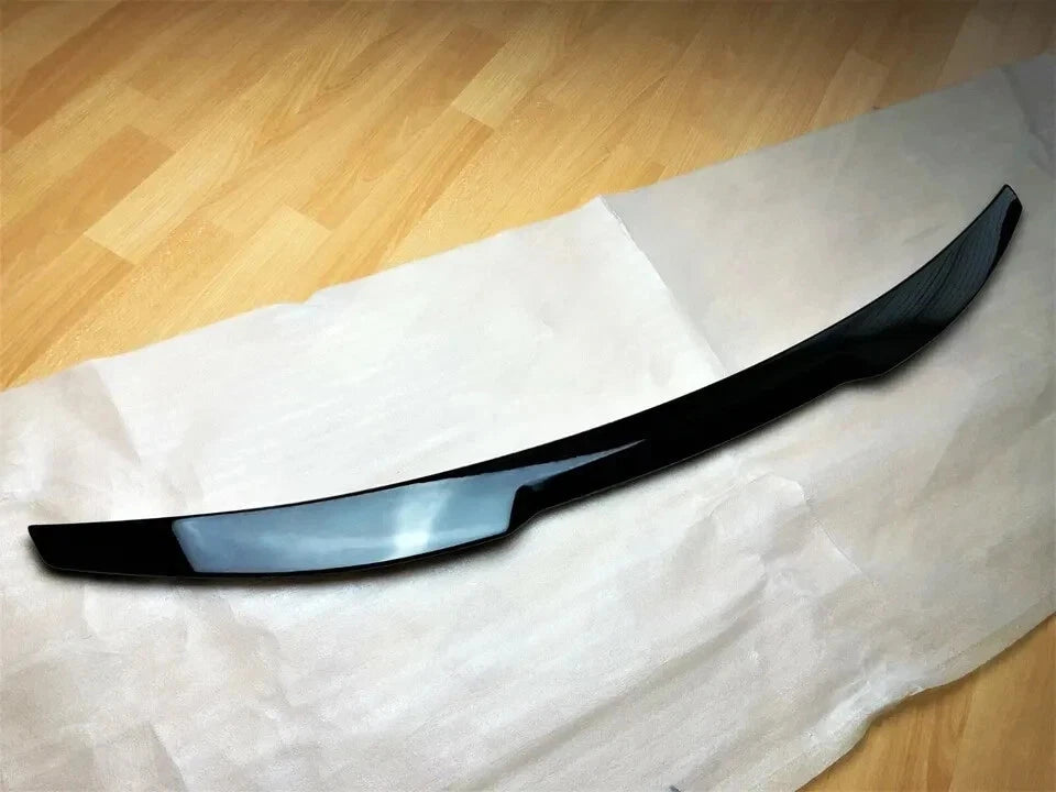 Gloss black M4-style boot lip spoiler wing installed on a 2020-2026 Audi RS3 Saloon 8Y