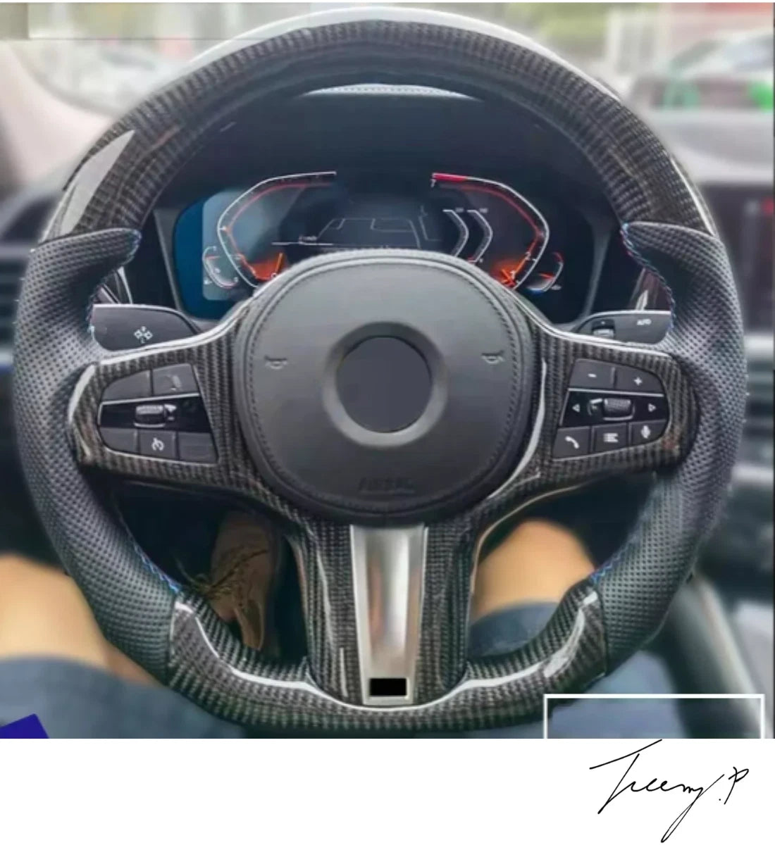Carbon fiber heated performance steering wheel installed on a 2018-2024 BMW X3 (G01), X4 (G02), X5 (G05), or X6 (G06)
