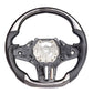 Carbon fiber heated performance steering wheel installed on a 2018-2024 BMW X3 (G01), X4 (G02), X5 (G05), or X6 (G06)
